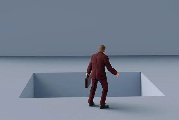 Man in front of Pitfall